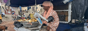 Fauzia Ali selling roasted plantains