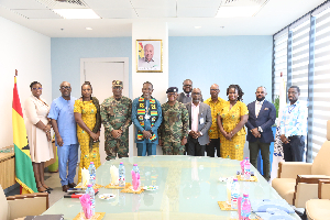 Brigadier General Anthony Ntem (M) with a delegation from the GCAA