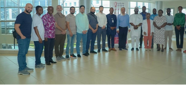 The teams from the UGMC and Qatar Charity after their meeting