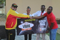 Boateng receiving his prize from Talal Fatal