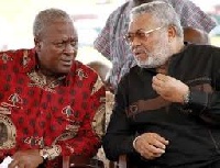 Prez John Mahama in a conversation with former Prez John Rawlings at an event