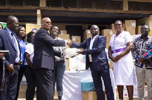 Mr Sowah left presenting the items to Dr Asare