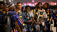 Players of the Black Stars arrived in Qatar wearing Fugu