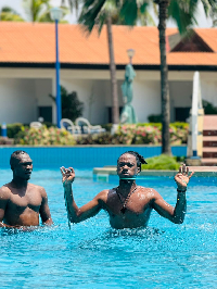William Terry Francis-Obeng working out in the pool with Totti Laryea