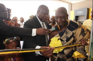 Robert Adamu assisting Togbui Nukaku Dugbaza to commission the Sogakope GCB