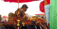 A chief in a palanquin