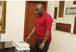 Dr Mahamudu Bawumia cutting his birthday cake