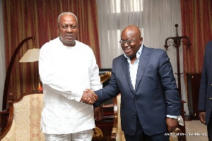 President Nana Addo Dankwa Akufo-Addo in an handshake with Former President John Mahama