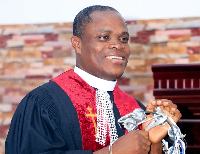 Rev. Chris Baah Nartey,