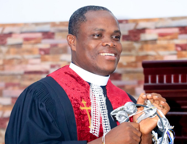 Rev. Chris Baah Nartey,