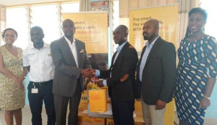 MTN team presenting the equipment to GNA