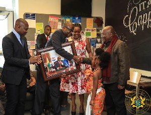 President Akufo-Addo being presented with a gift by members of the Ghanaian community in Worcester