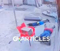 The footage shows about four armed robbers,