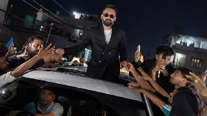 Balendra Shah celebrating with supporters after defeating Nepalese Prime Minister Sharma KP Oli