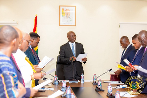 Dr Cassiel Ato Forson, Minister of Finance swearing-in the members of the Ghana Gold Board