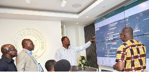 Julius Neequaye Kotey making a point in Mineral Commission room for tracking excavators