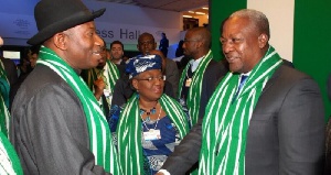 Former Nigerian President, Goodluck Jonathan exchanges pleasantries with President John Mahama.