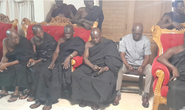 The minister among some of the traditional council members