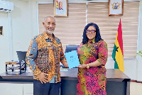 Alex Mould (L) paid a visit to the Gender Minister Dr Naa Momo Lartey (R)
