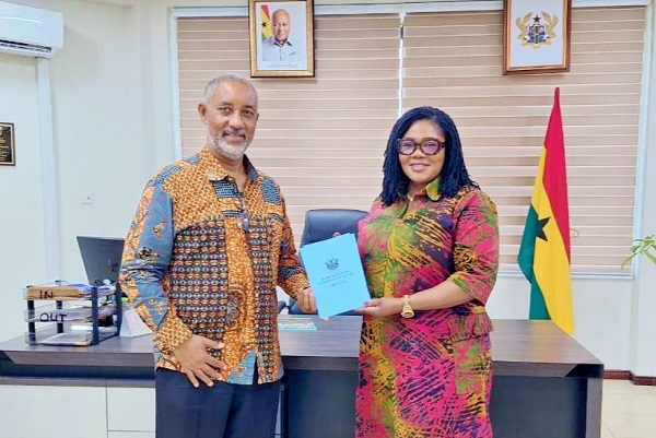 Alex Mould (L) paid a visit to the Gender Minister Dr Naa Momo Lartey (R)