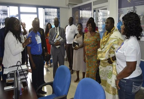 Mrs. Mabel Porbley (first left) talking to dignitaries present at the launch.