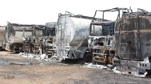 The fire destroyed about 13 fuel tankers