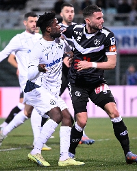 Daniel Afriyie Barnieh holds off an opponent