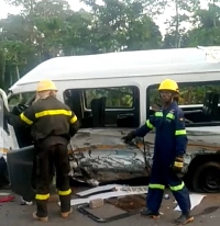 Personnel of the Ghana Fire Service at the scene of the accident at Gomoa Odumase
