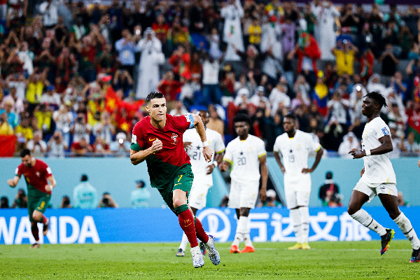 Ronaldo wheels away after scoring the contested penalty