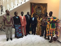 Papa Owusu Ankomah (M) commended the cocoa farmers for working relentlessly