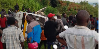Wreckage of the Babugi Nursery and Primary School van at the scene of the accident on Bugombwa Hill