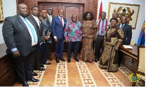 President Akufo-Addo with the newly appointed NLC board members