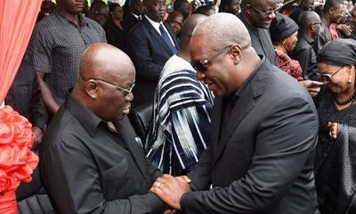 President Mahama (right) in a handshake with Nana Akufo-Addo