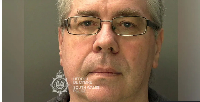 Christopher Phillips was arrested after his mother's body was found in the family's home
