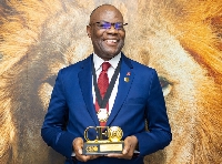 Chris Ofikulu with his trophy