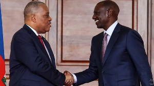 Haiti's Prime Minister Garry Conille (L) is in Kenya for talks with President Willian Ruto (R)