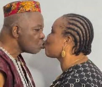 Nollywood actor, Chiwetalu Agu and wife share a kiss