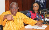 Deputy Commissioner in-charge-of Operations at the EC, Amadu Sulley (L), Charlotte Osei (Right)