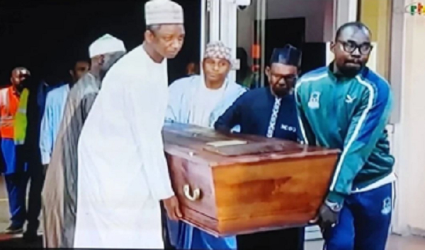 The late CAF President, Issa Hayatou's remains in a casket