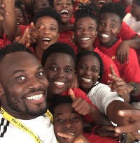 Michael Essien with some of the players