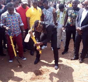 Gyan breaks the ground for the project to begin