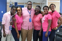 Some tigo staff wearing pink to create cancer awareness