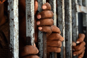 Hands Prison Bars