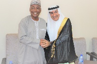 Minister for Zongo and Inner City Development in a handshake with leader of the Saudi delegation