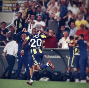 Andre Ayew celebrates his goal after his powerful header gave Fenerbahce the equaliser