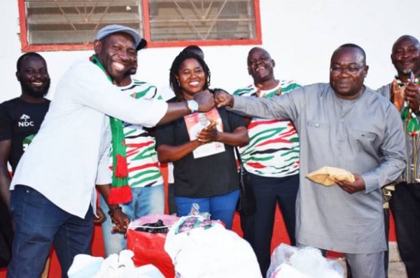 Lawyer Lamtiig Apanga presenting some items to the Nabdam Constituecy