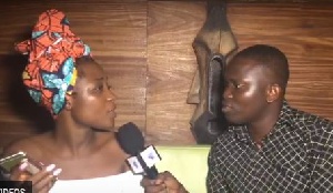 Efya speaking to a reporter