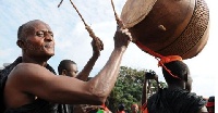 Dance and song are part of funerals in Ghana