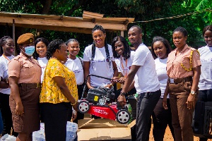 The Influential Woman Foundation presenting mower to Nsawam Female Prisons