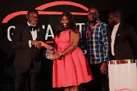 Ayodeji Olabisi receiving the award